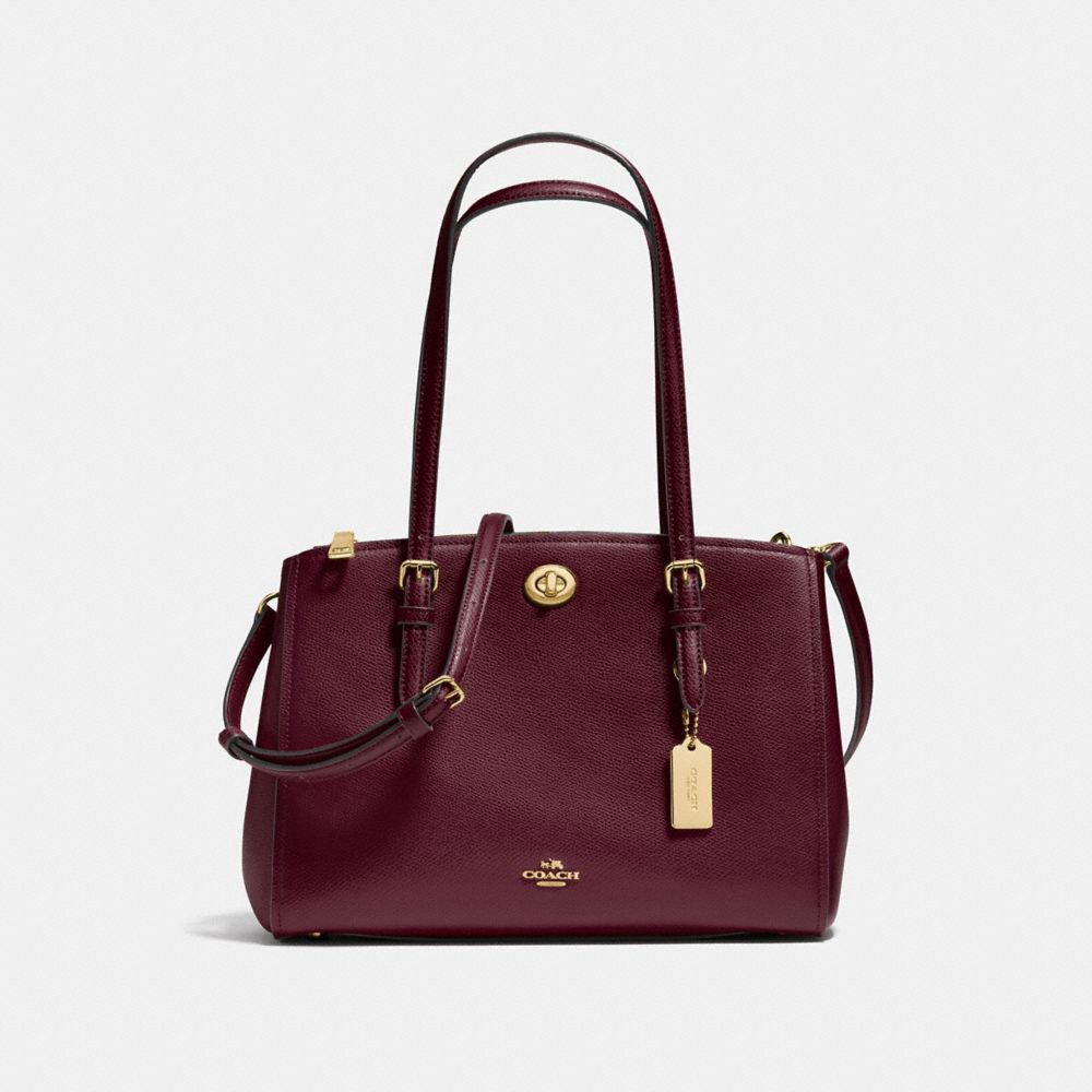 coach 蔻驰 turnlock carryall 29 女士手提包